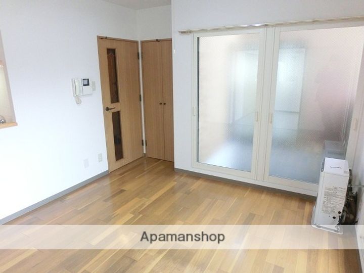 北海道札幌市西区山の手三条6丁目の賃貸マンションの居間