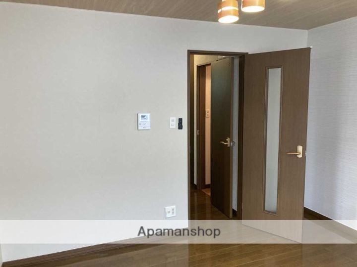 北海道札幌市手稲区新発寒六条4丁目の賃貸アパートの居間