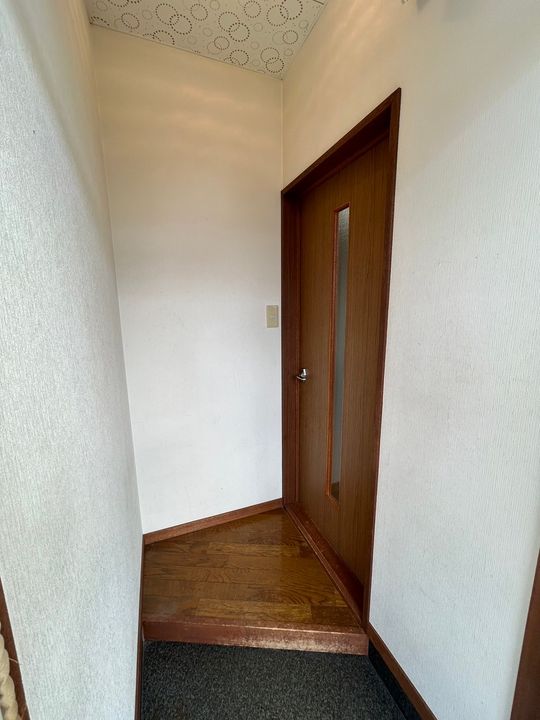 メゾンドエイシン202の玄関