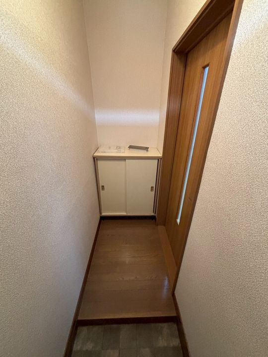 ロイヤル・KANASE・永山202の玄関