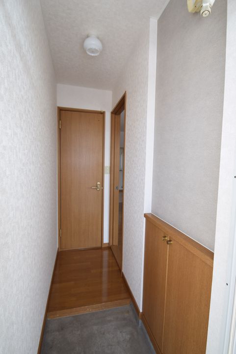 パークサイドまつばらA202の玄関