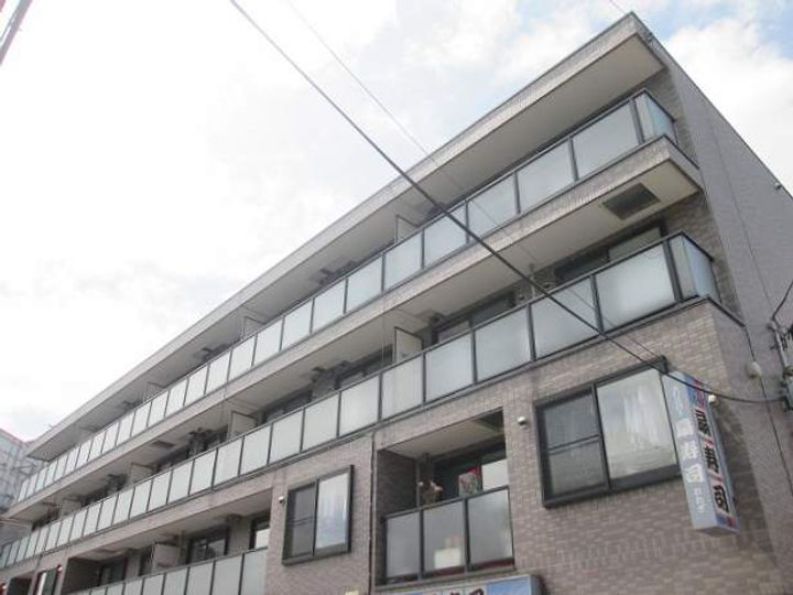 カルフール麻生307の外観