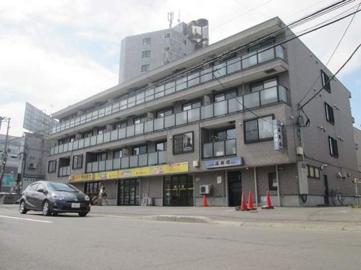 カルフール麻生307の外観