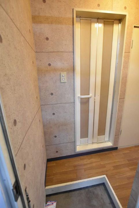 プチメゾン105の玄関