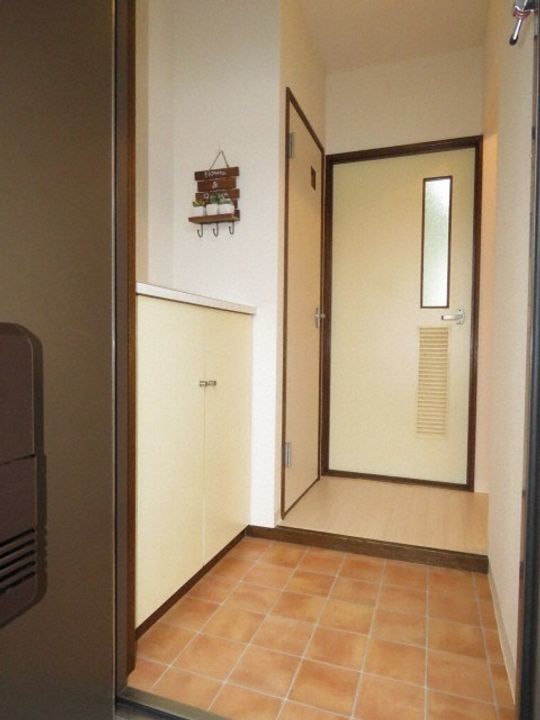 エスポアールさつみ202の玄関