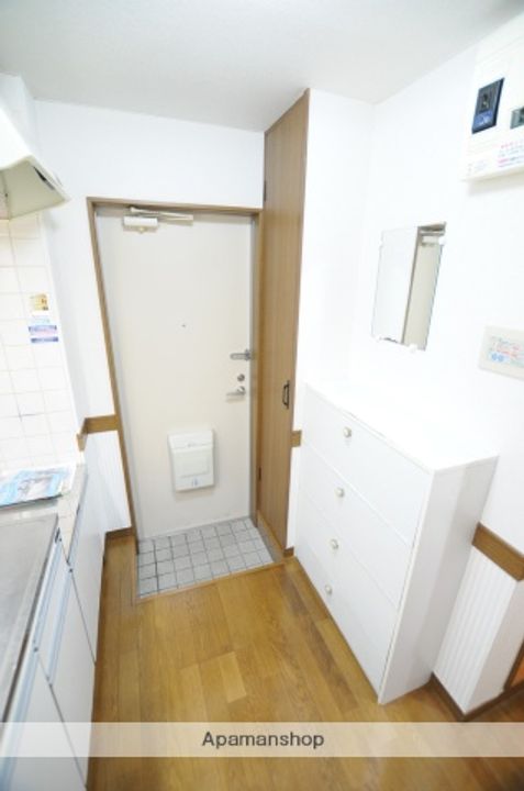 コンフォートタカノ102の玄関