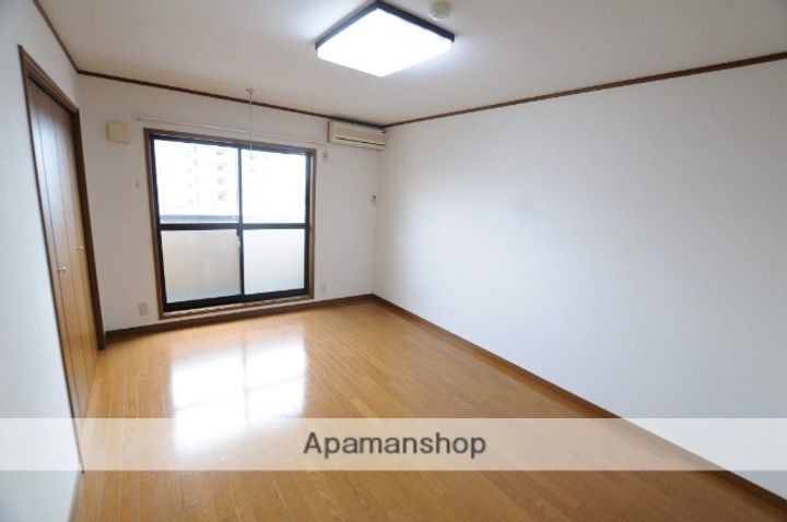 宮城県仙台市宮城野区田子1丁目の賃貸アパートの居間