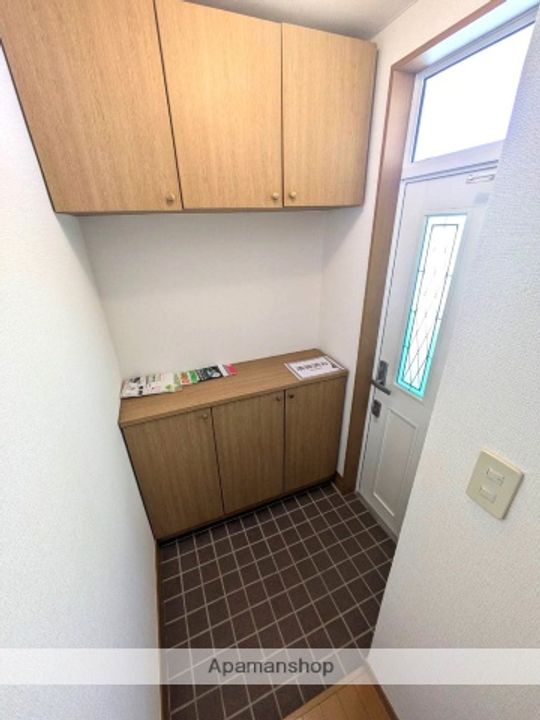 エクセルシャトー一森山A棟202号室の玄関