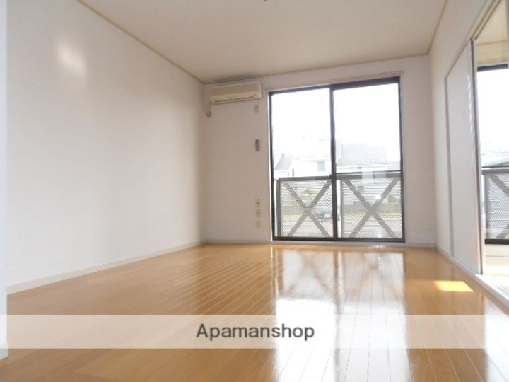 宮城県仙台市宮城野区田子1丁目の賃貸アパートの居間