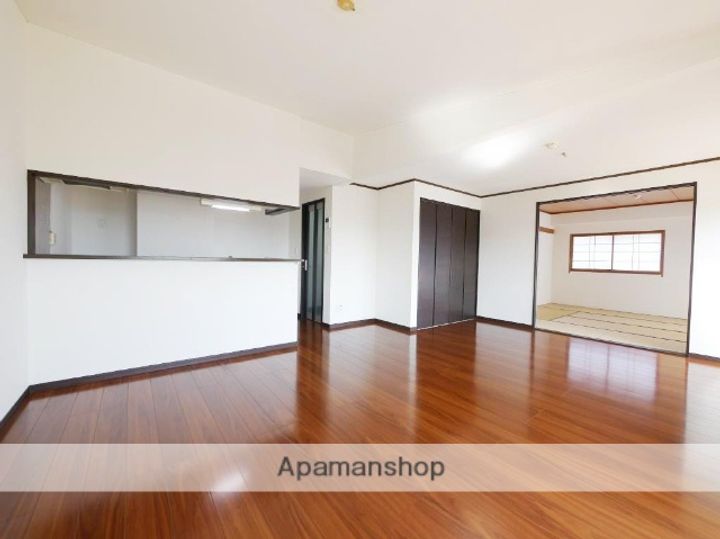 アークヒルズ小松島606の居間