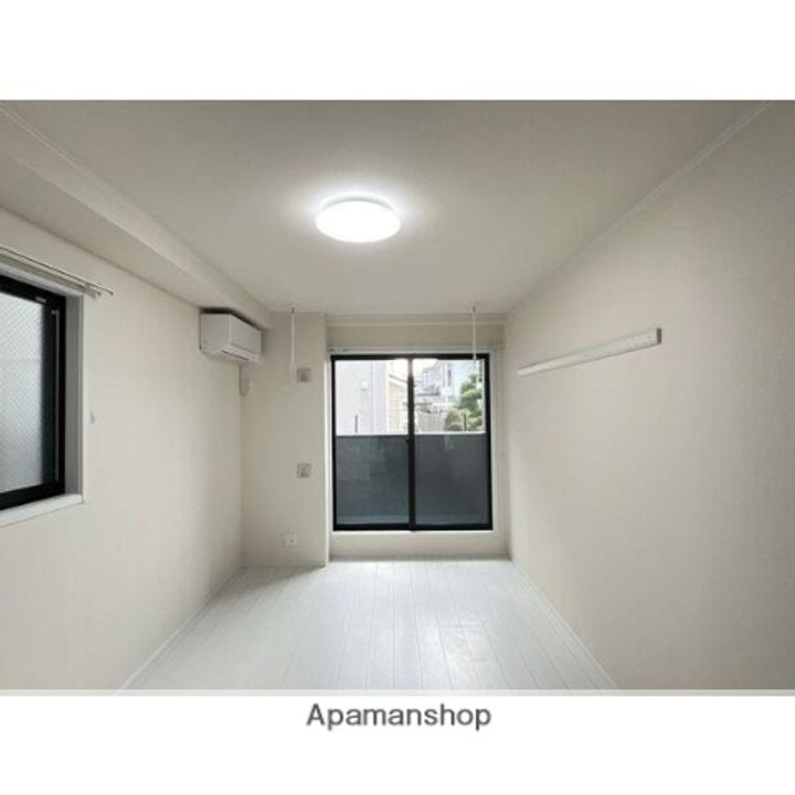 宮城県仙台市若林区木ノ下4丁目の賃貸アパートの居間