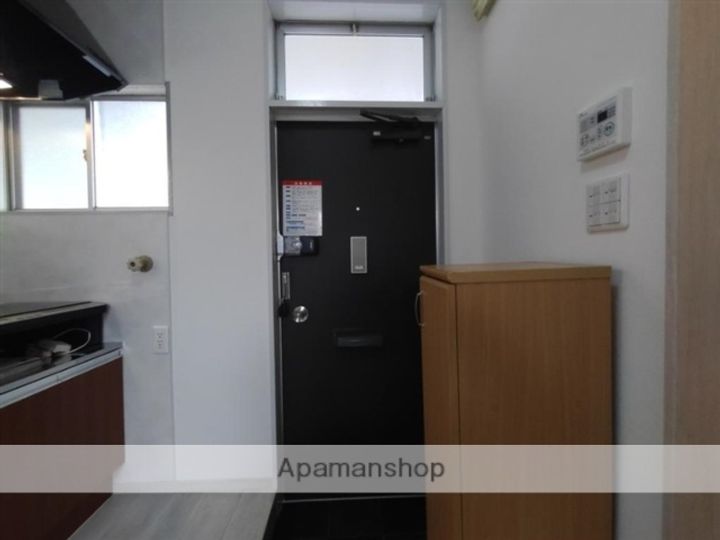 ピースフル旭ケ丘203の玄関