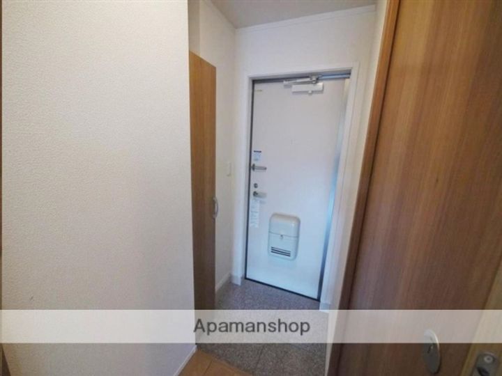 タウンコート八乙女107の玄関