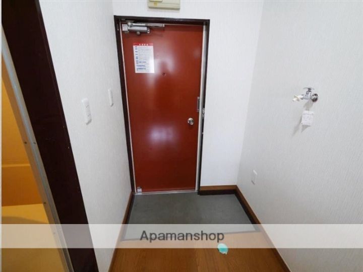 プランド旭ケ丘203の玄関