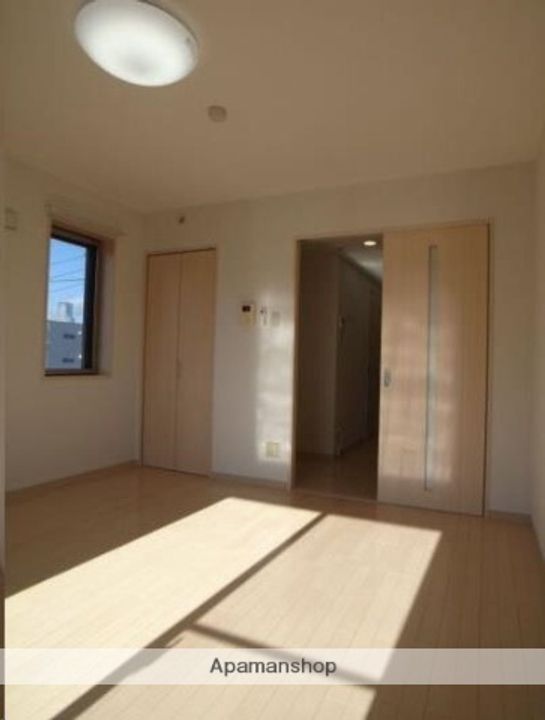 宮城県仙台市若林区南材木町の賃貸マンションの居間