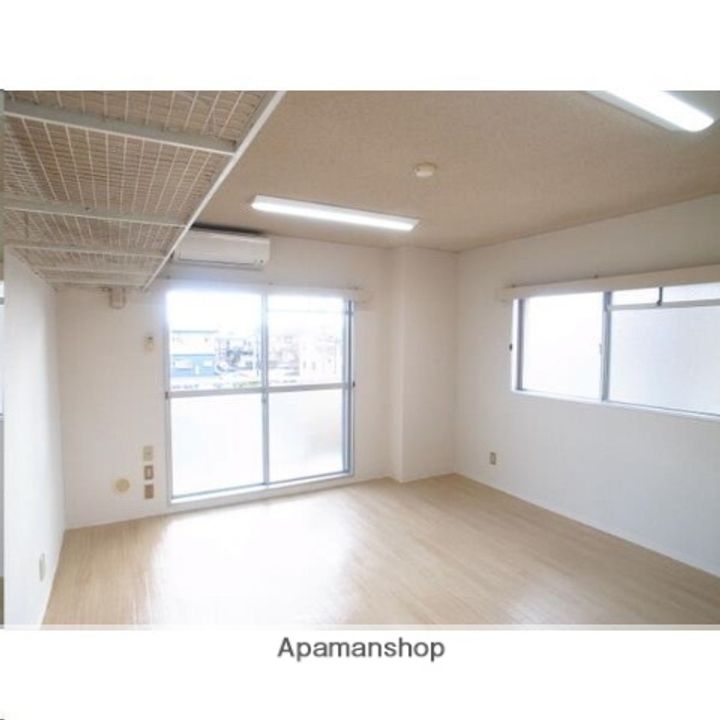 宮城県仙台市宮城野区福田町2丁目の賃貸マンションの居間