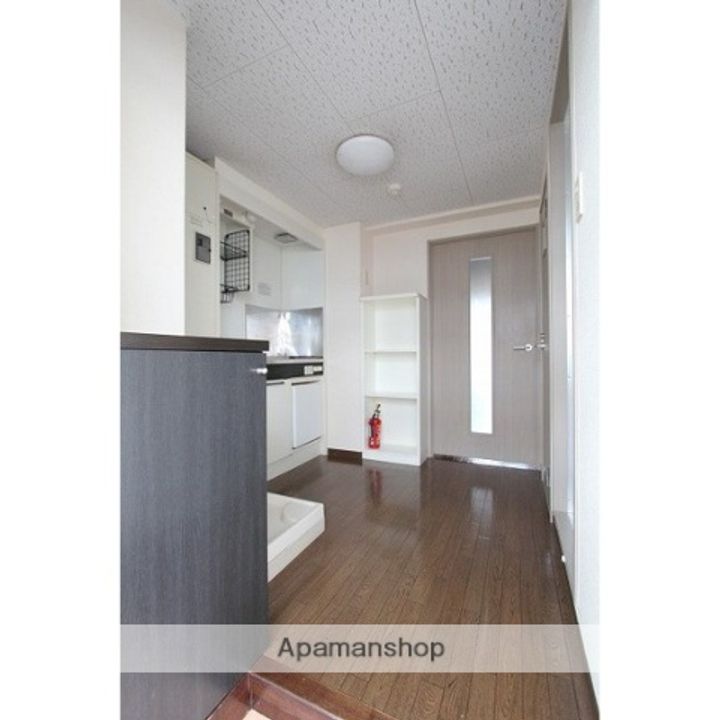 ベルシティエクセル泉108の玄関