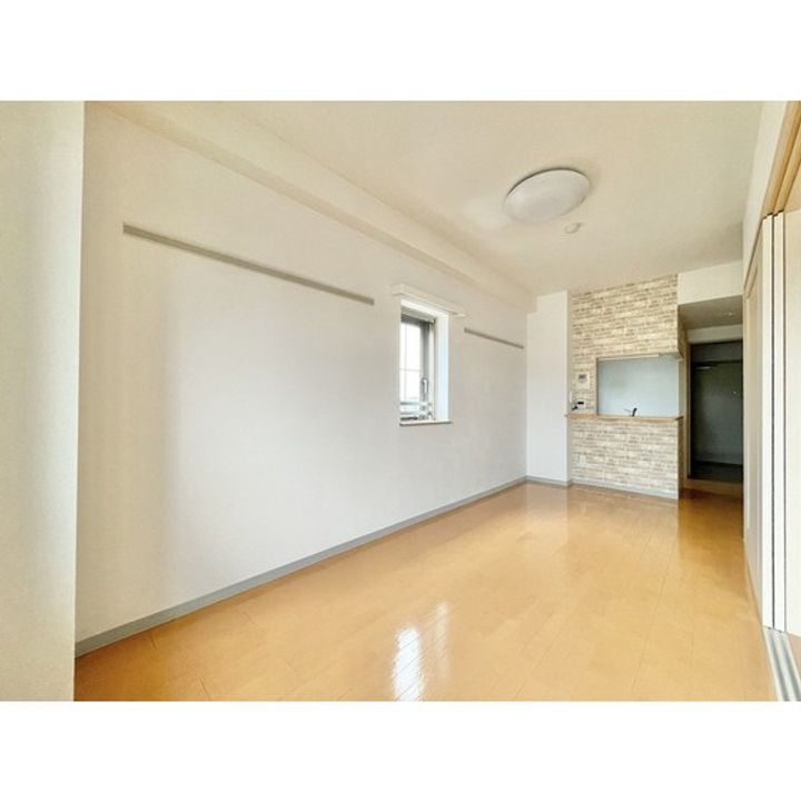 CAMELLIAガーデン八幡505の居間