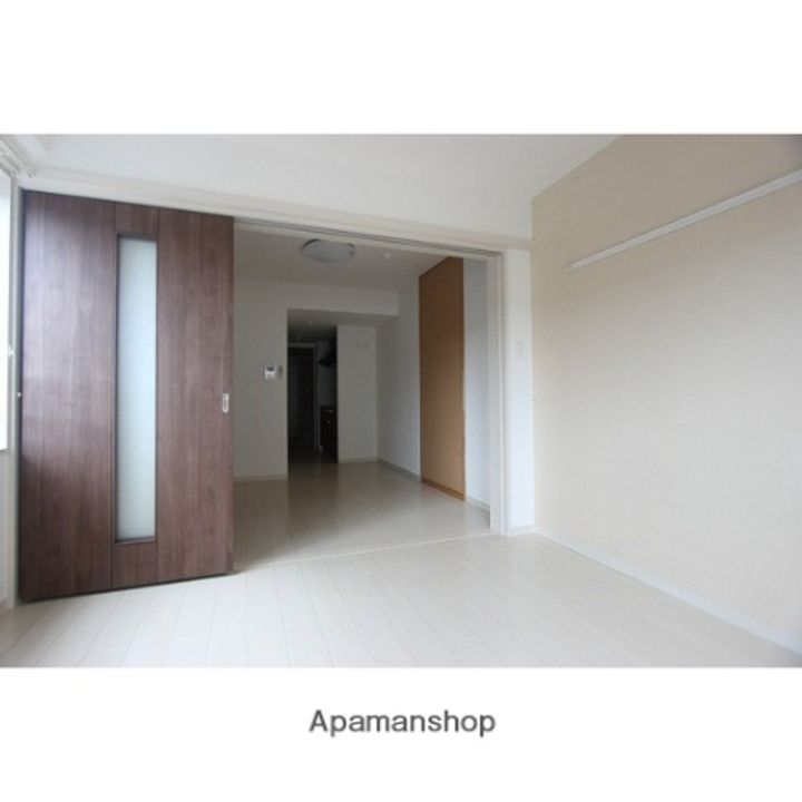 アスコット苦竹駅前212の居間