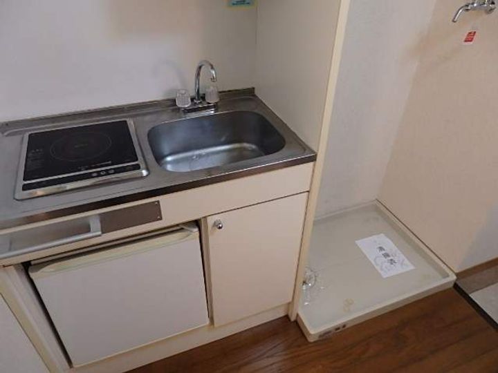 宮城県多賀城市八幡字庚田の賃貸アパートのキッチン