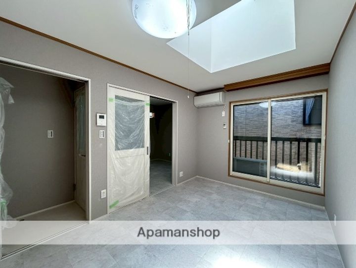 秋田県秋田市大町2丁目の賃貸アパート203の居間