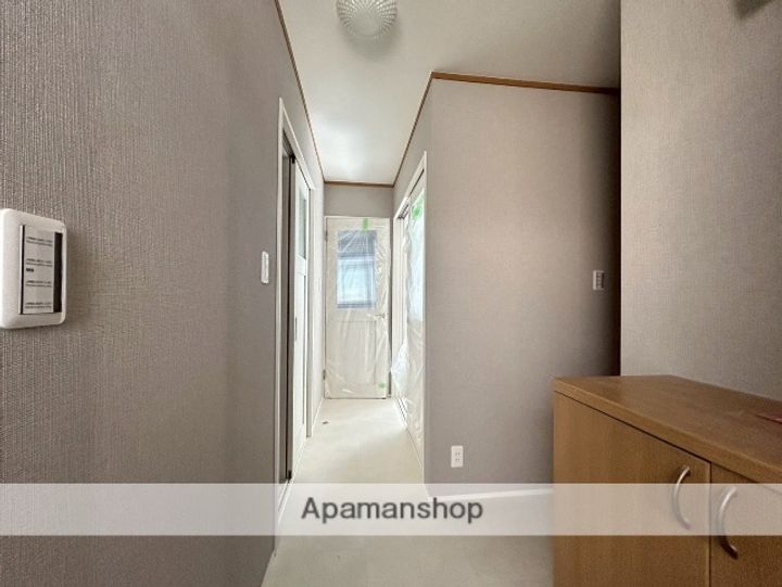 秋田県秋田市大町2丁目の賃貸アパート203の玄関