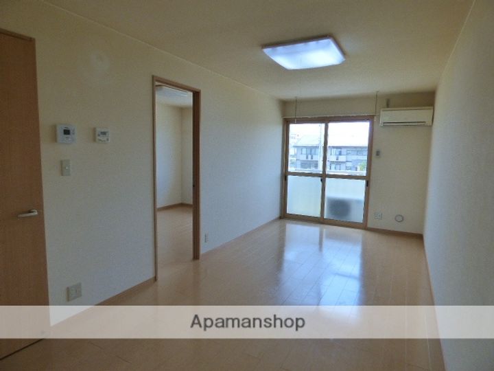 秋田県秋田市八橋イサノ1丁目の賃貸アパートの居間