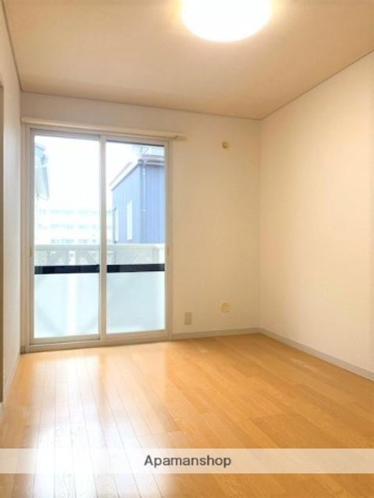 秋田県秋田市飯島緑丘町の賃貸アパートの居間