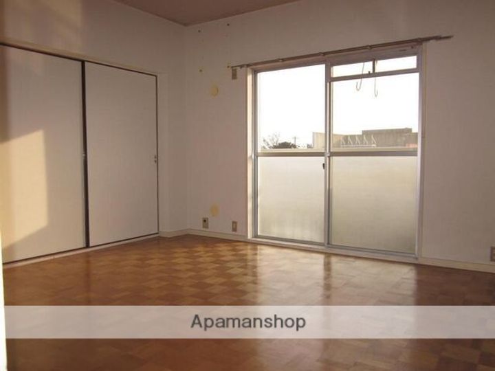 秋田県秋田市川元小川町の賃貸マンションの居間