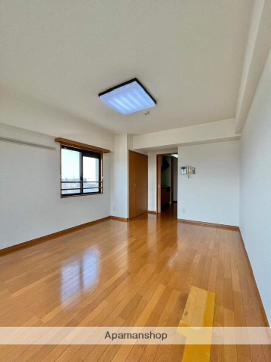 秋田県秋田市御所野元町3丁目の賃貸マンション501の居間