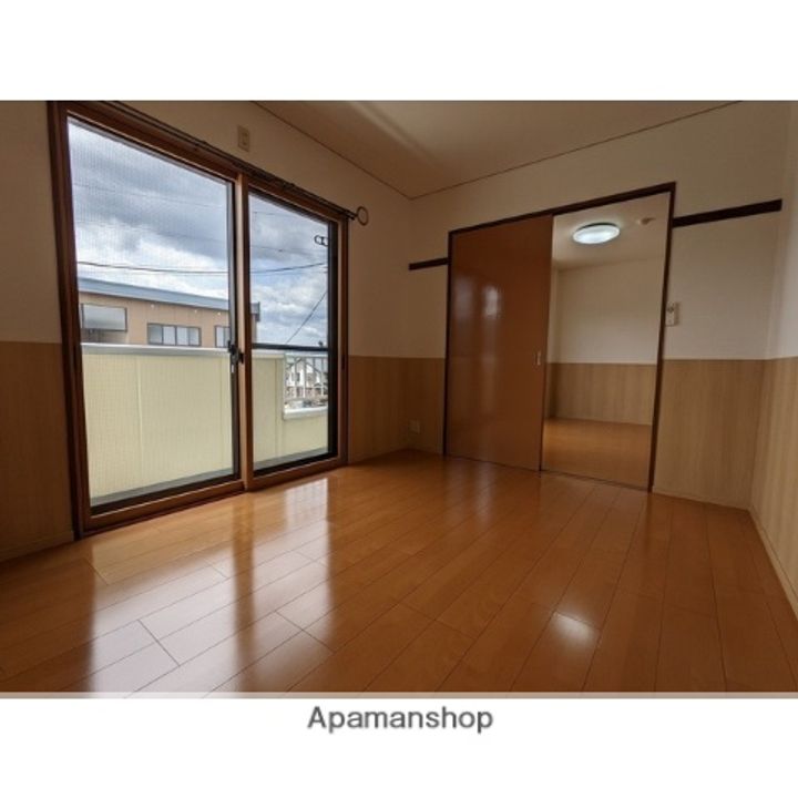 ヤマサン五十鈴 A棟307の居間