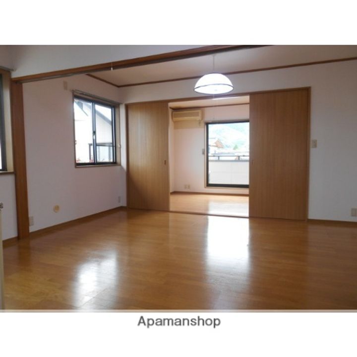 アークシティ花楯 D棟201の居間