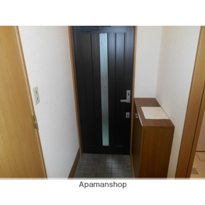 アークシティ花楯 D棟201の玄関