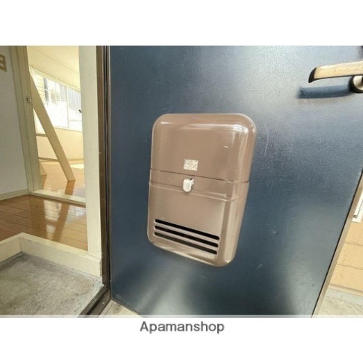 ザ・フリーダムハウス203の玄関