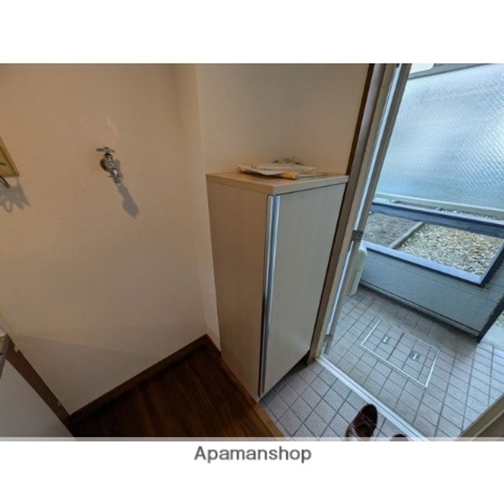 アメニティコーポ K101の玄関