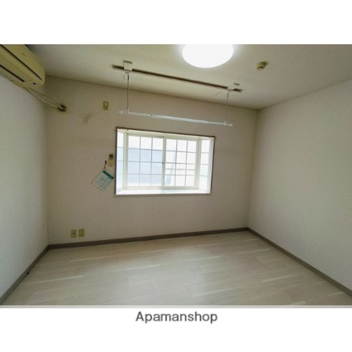 桜まちテラス B棟210の居間