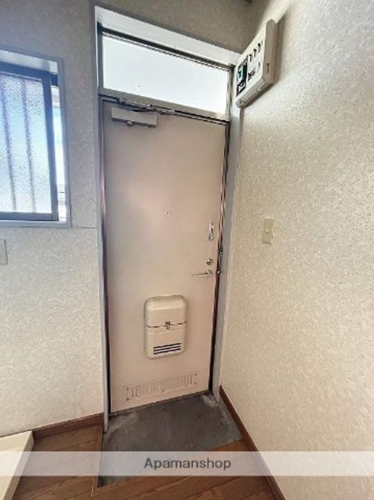 ミノルハイツ203の玄関