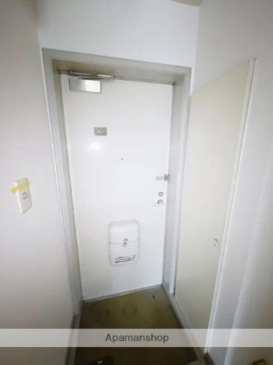 メイプルハイツ(峰)102の玄関