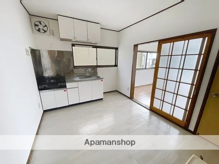 ヤシオハイツ201の居間