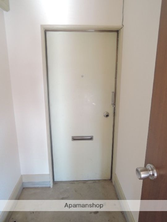江川コーポ105の玄関