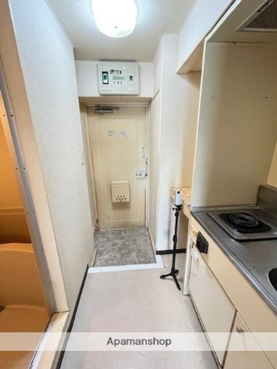 ホワイトハイツ鹿島台208の玄関