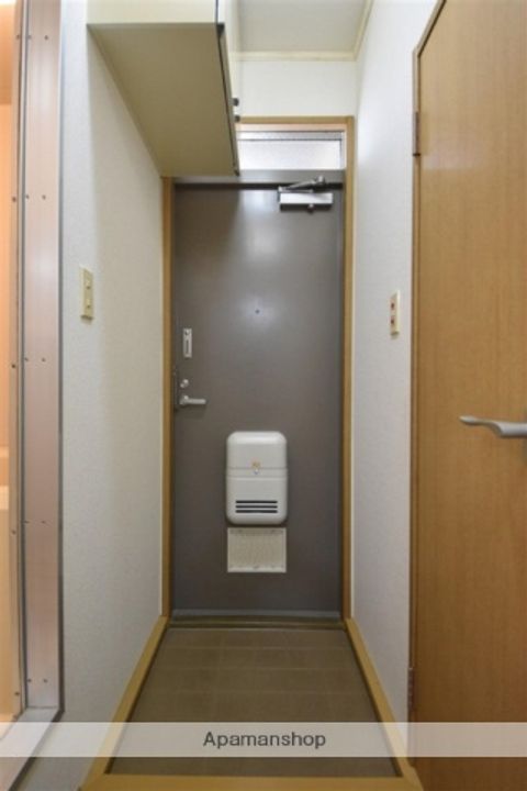 メルローズ朝倉112の玄関