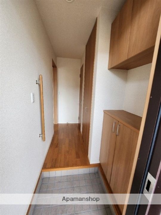 クラヴィエコスモ上泉 壱番館・弐番館2-102の玄関