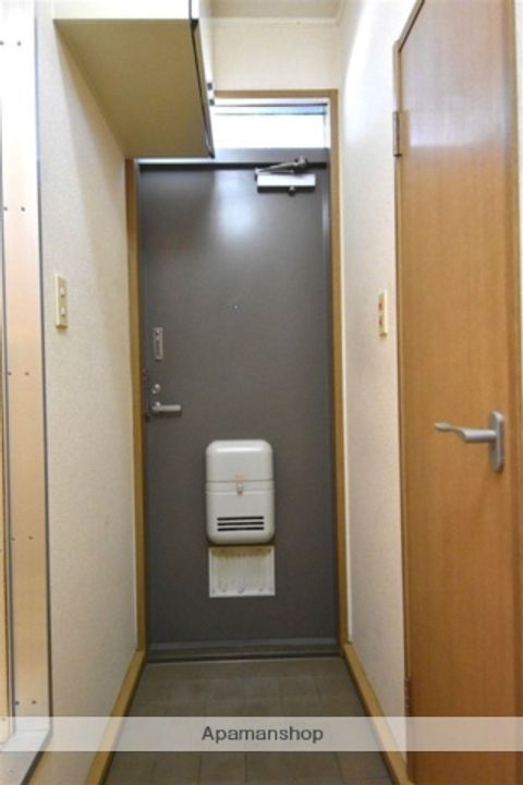 メルローズ朝倉108の玄関