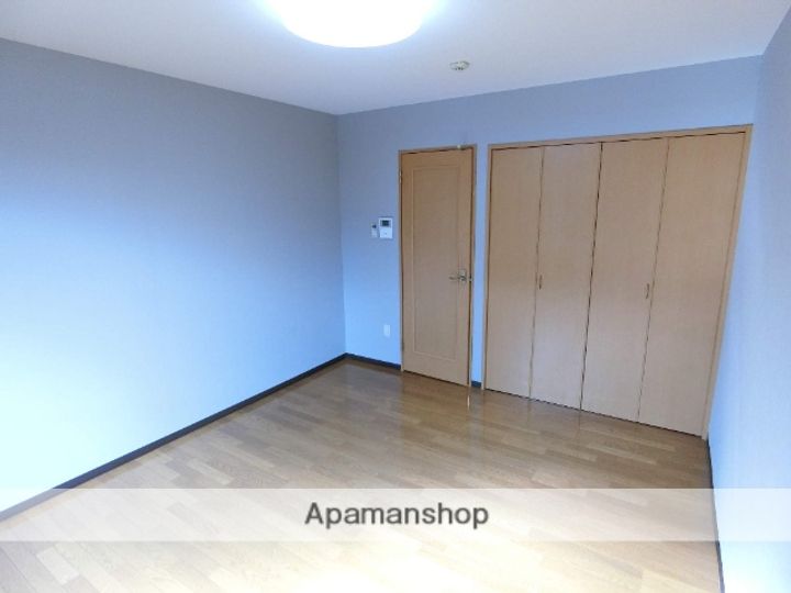 メゾン光104の居間