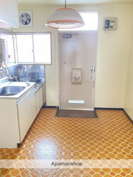 コーポスガ102の玄関