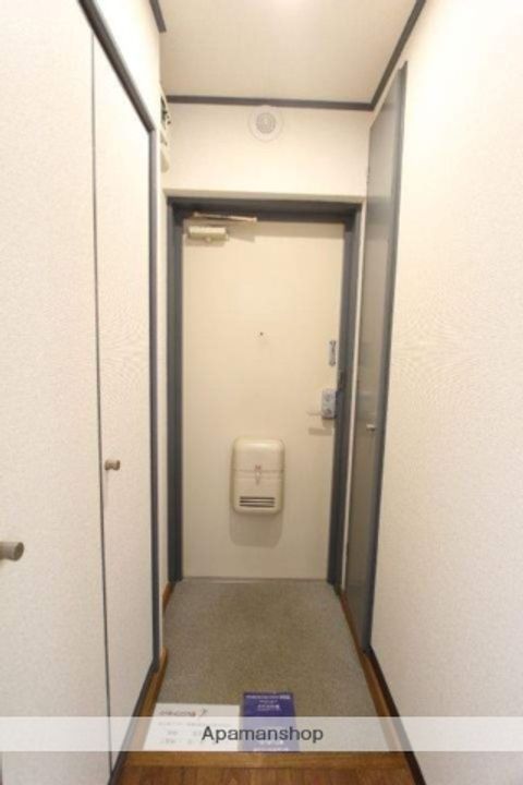エスタリオ新田101の玄関