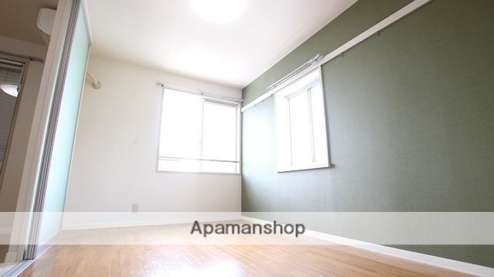 SKコーポ203の居間