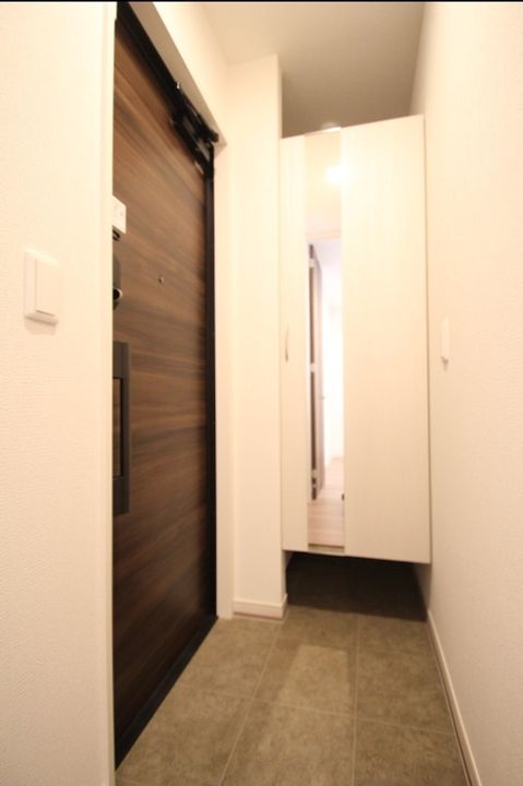 コンフォート北綾瀬の玄関