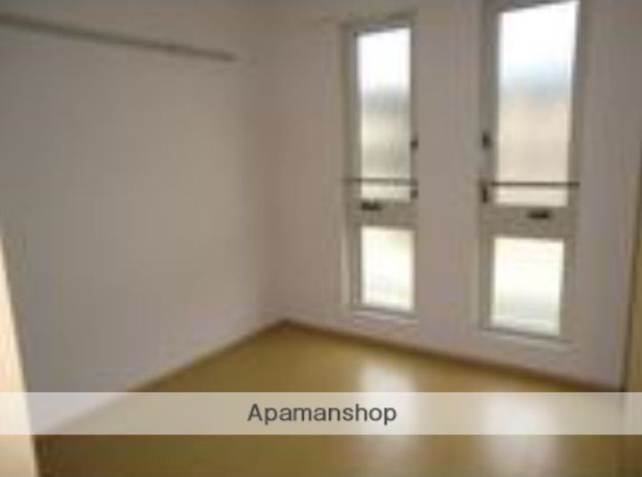 東京都小金井市緑町1丁目の賃貸アパートの居間